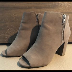 Grey suede booties with zipper accessory